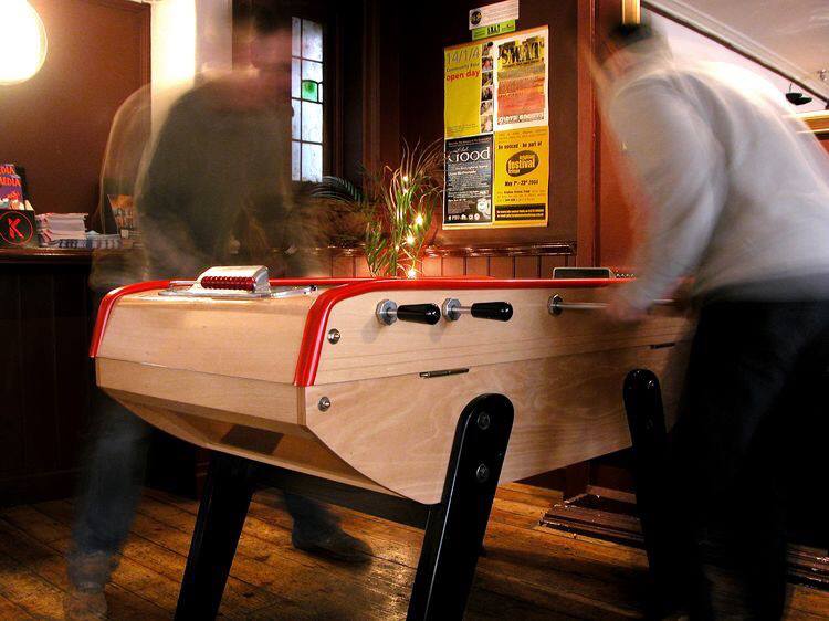 Teqball vs Foosball vs Ping Pong: Which Game Table Is Right for You? - GamesDNA Thailand 2 players on Bonzini Original foosball table